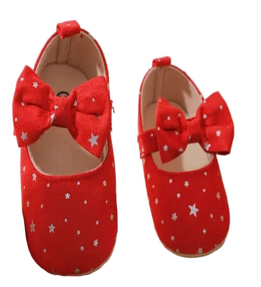 Kerstschoentjes: ballerinas met strik en zilveren sterren