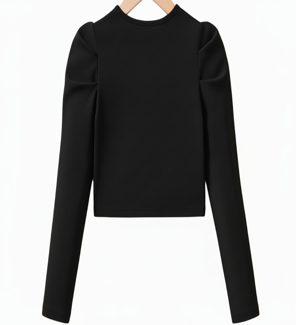 Mooi kort jasje voor over een avondjurkje. Zwart met pareltjes