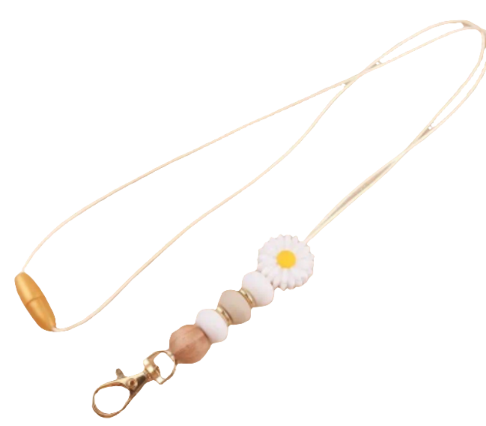 Diverse vrolijk gekleurde speenkoorden met bloemetjes en kralen