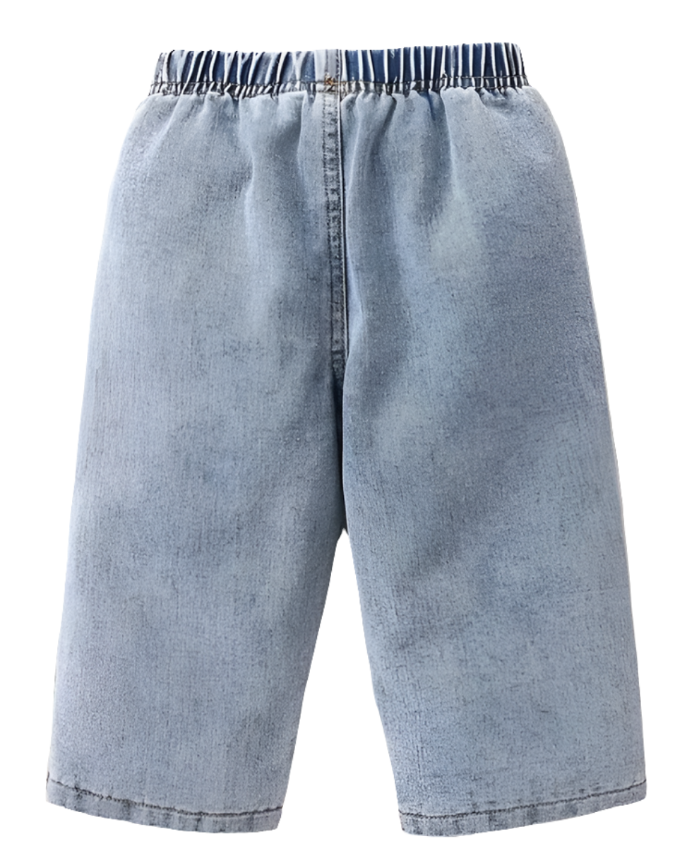 spijkerbroek bleached met hartjes. Met elastische band en is wijdvallend model.