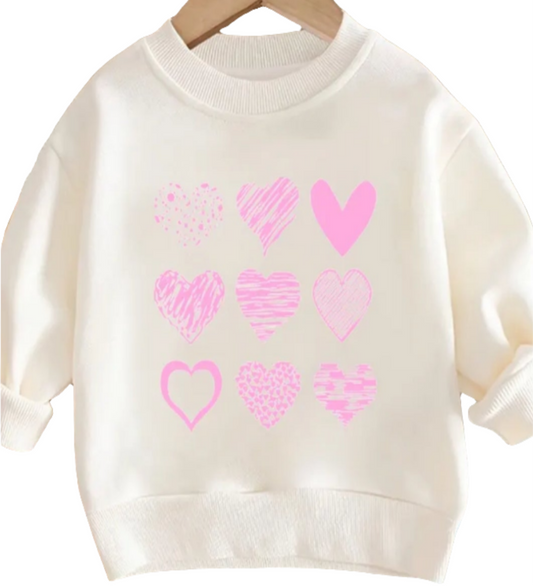 sweater wit met roze hartjes