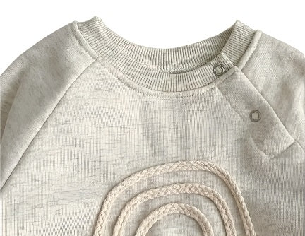 Katoenen romper crème regenboog met lange mouwen