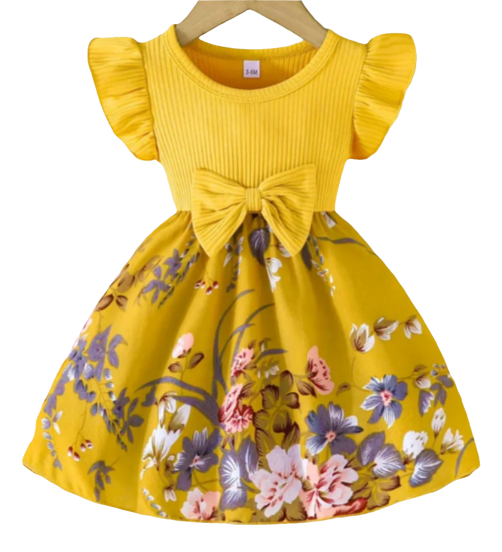 Jurk geel met bloemen en strik( te combineren met de gele schoentjes)