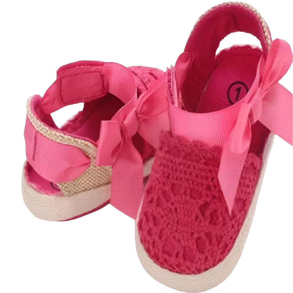 Jurk wit met roze bloemen en strik ( te combineren met de roze schoentjes)