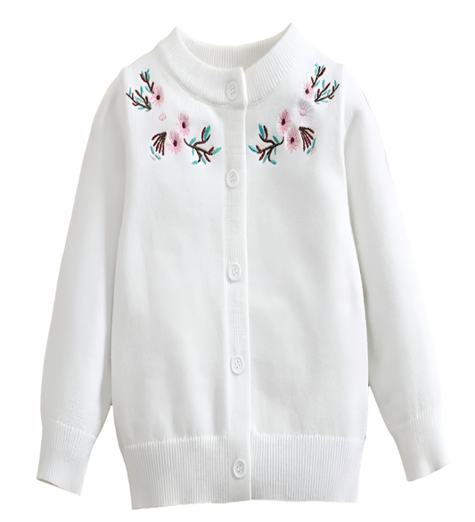 wit vestje met geborduurde bloemetjesrand langs hals