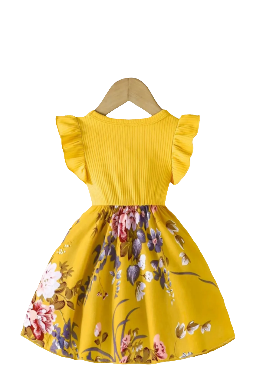 Jurk geel met bloemen en strik( te combineren met de gele schoentjes)