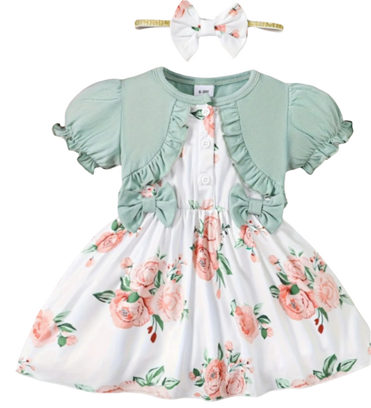 Jurkje wit met bloemen met vast groen vestje en haarband.