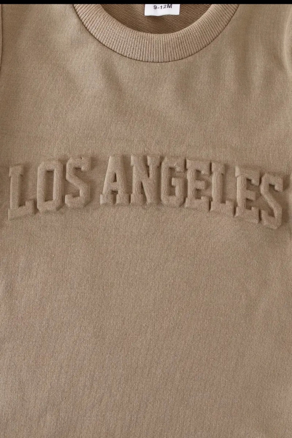set:" LOS ANGELES". shirt met short in kaki