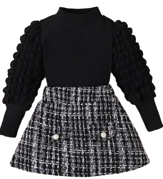 setje zwarte top met aparte mouwen en geruit rokje in zwart wit