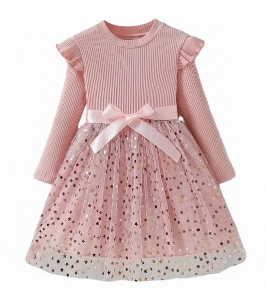 jurk voor Kerst. Bovenzijde van tricot en onderzijde van tule met gouden spikkels. In roze ,zwart en wijnrood  verkrijgbaar.