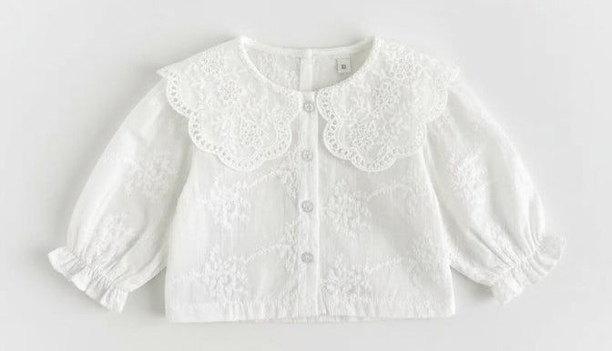 blouse van broderie met grote kraag